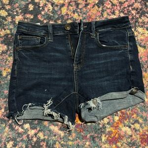 American Eagle Outfitters
Size:4
A dark wash blue style 
Next level stretch